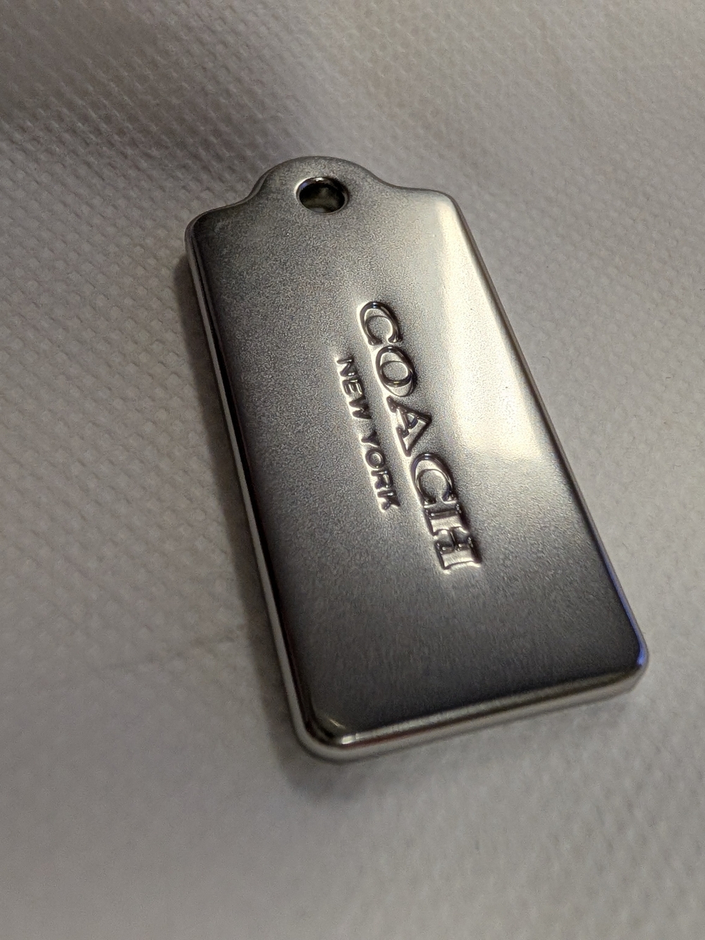 COACH Silver Logo Key Tag - Metallic Silver Accessory